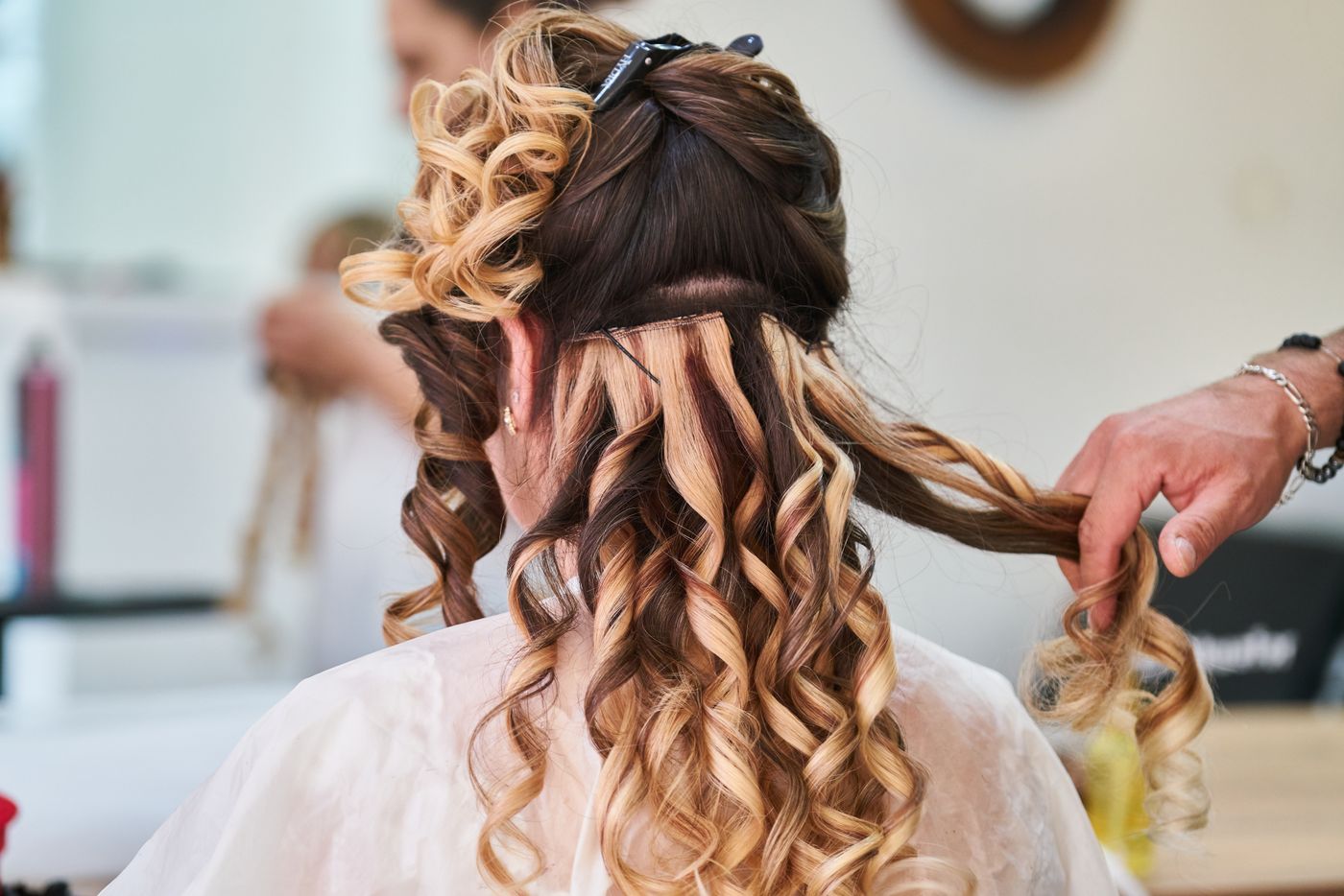 A stylist finishing a cut at Marlowe and Vine